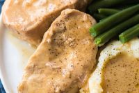 Slow Cooker Pork Chops in Savory Garlic-Herb Sauce