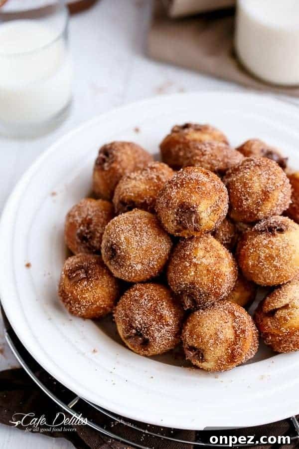 Nutella Churro Donut Holes on a plate 