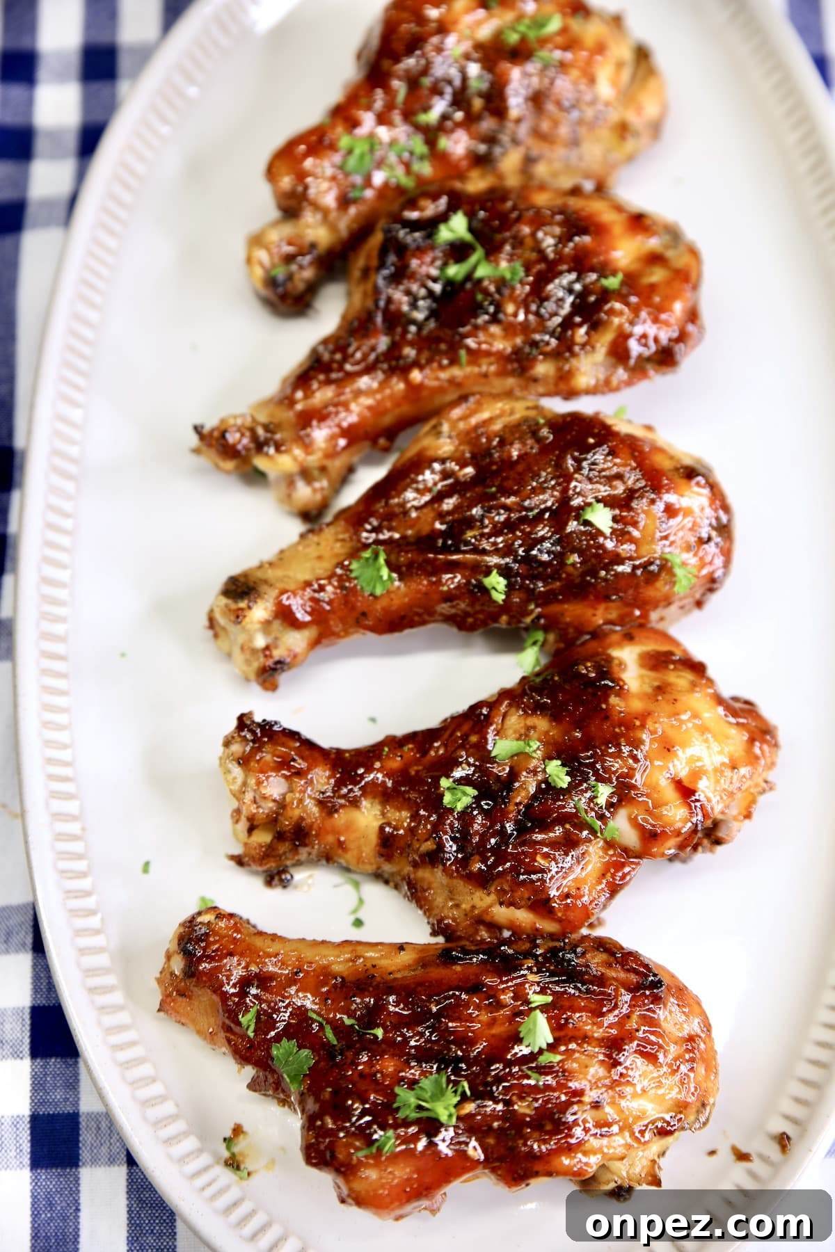 Platter of bbq chicken drumsticks.