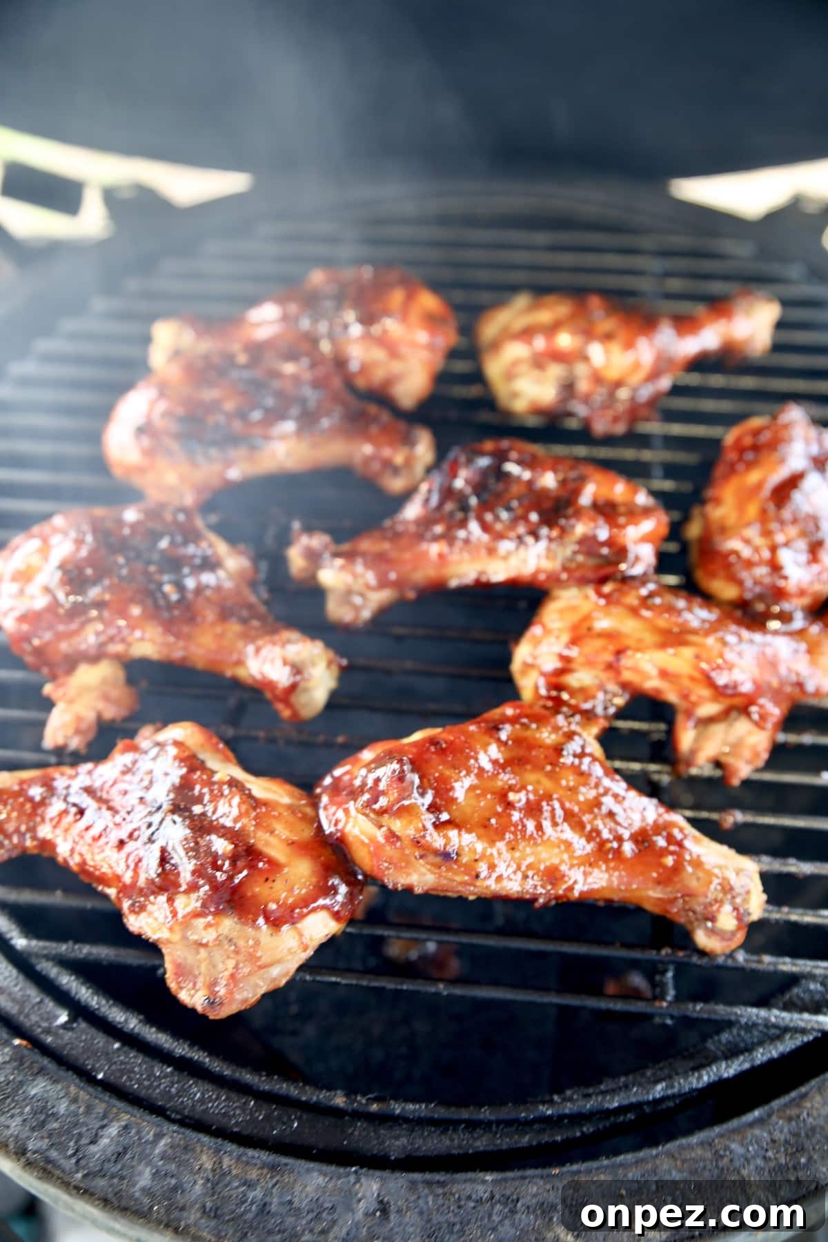 Grilling BBQ Chicken legs.
