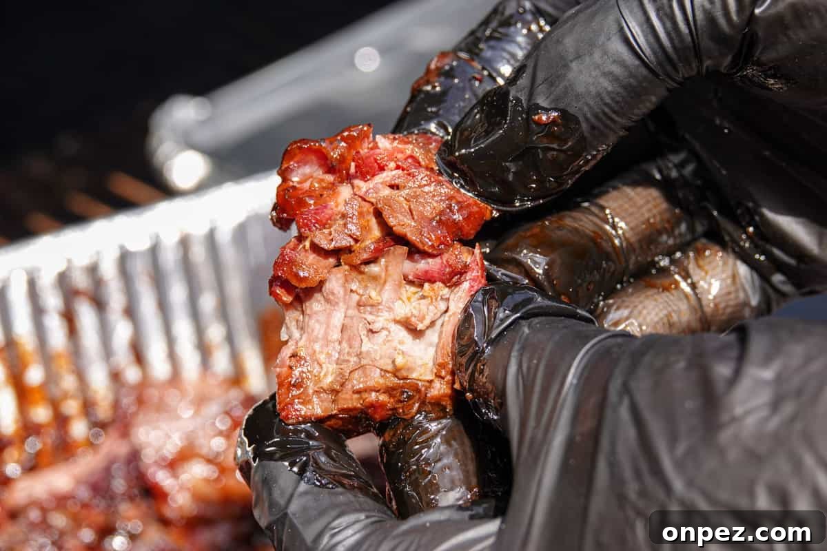 Budget Burnt Ends: Incredibly Tender Brisket Bites 9 smoked burnt ends ripped apart by hand to show how tender it is