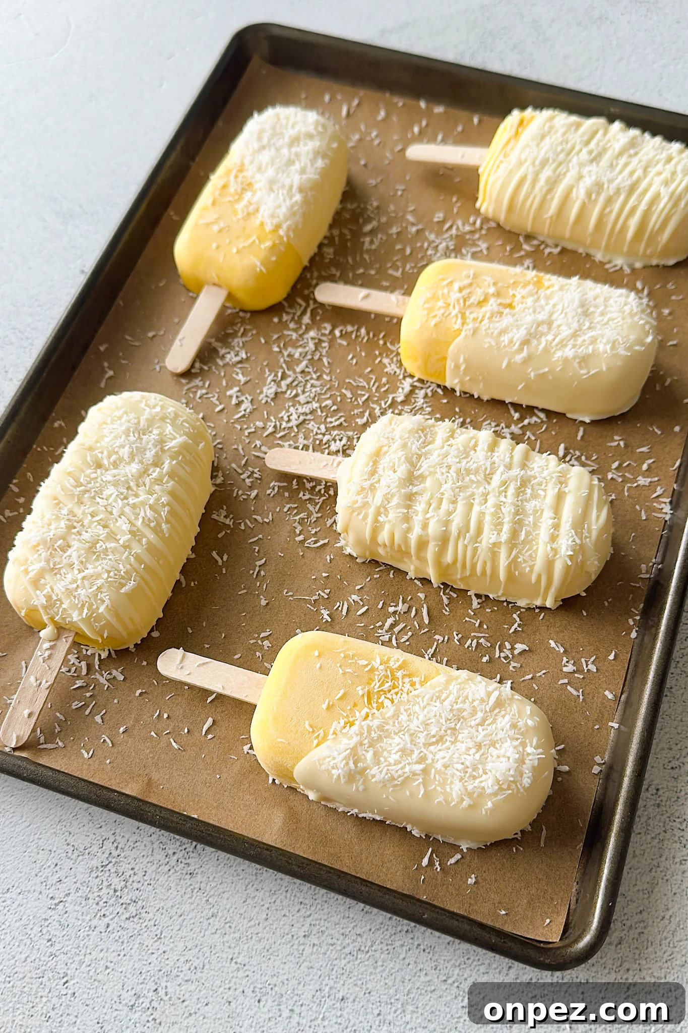 Mango coconut ice cream bars.