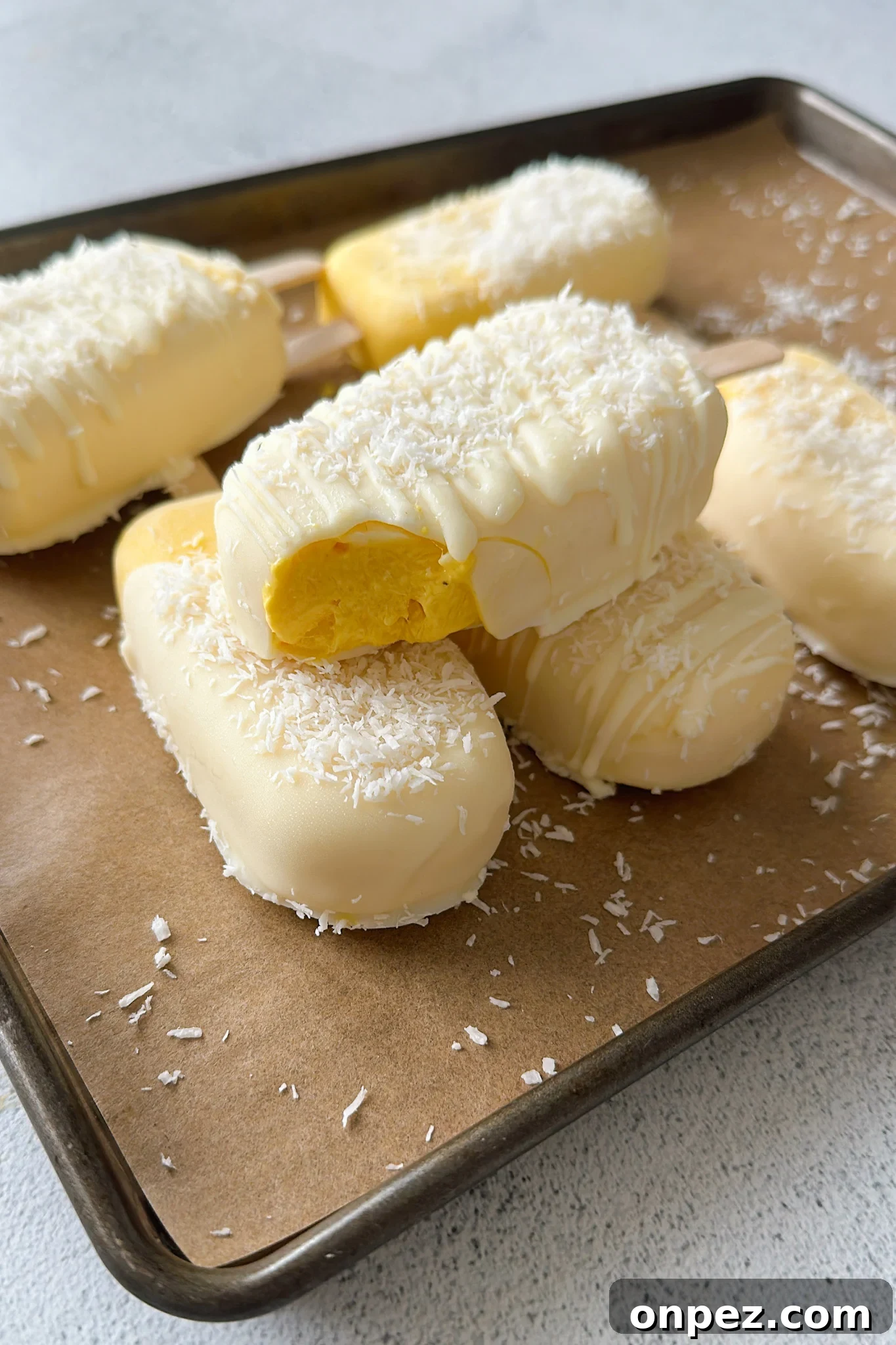 Mango coconut ice cream bars.