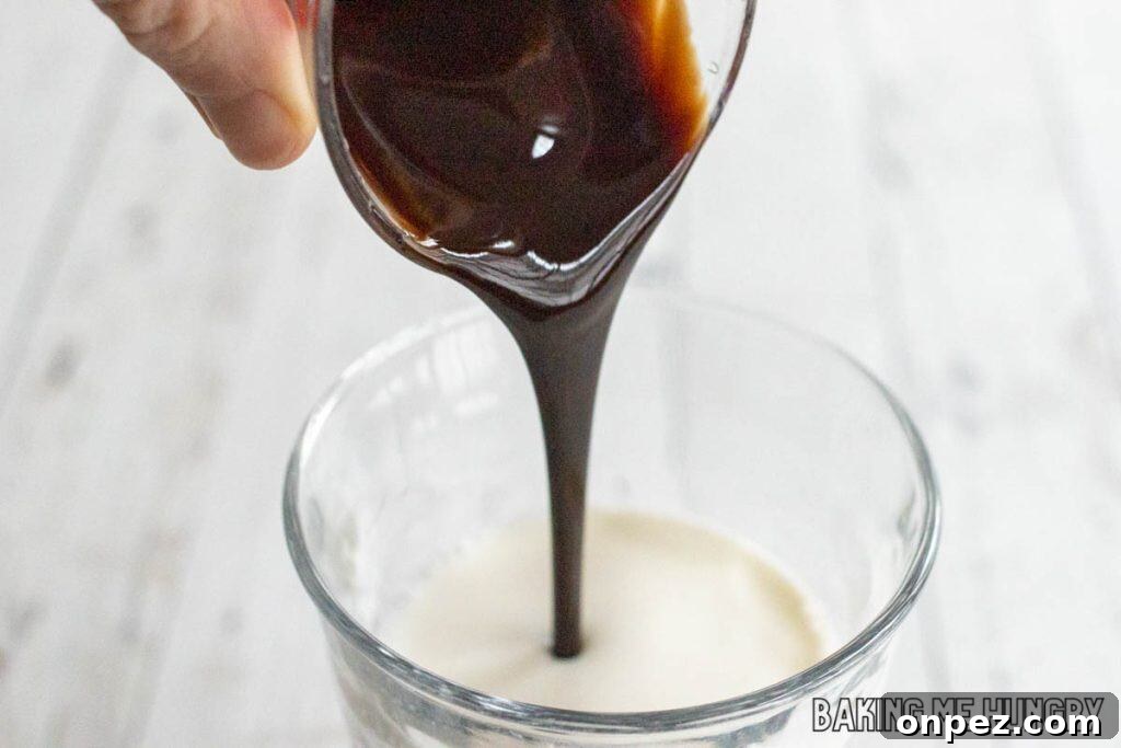 Iced Peppermint Mocha Recipe: Mint Chocolate Coffee 5 chocolate syrup being added
