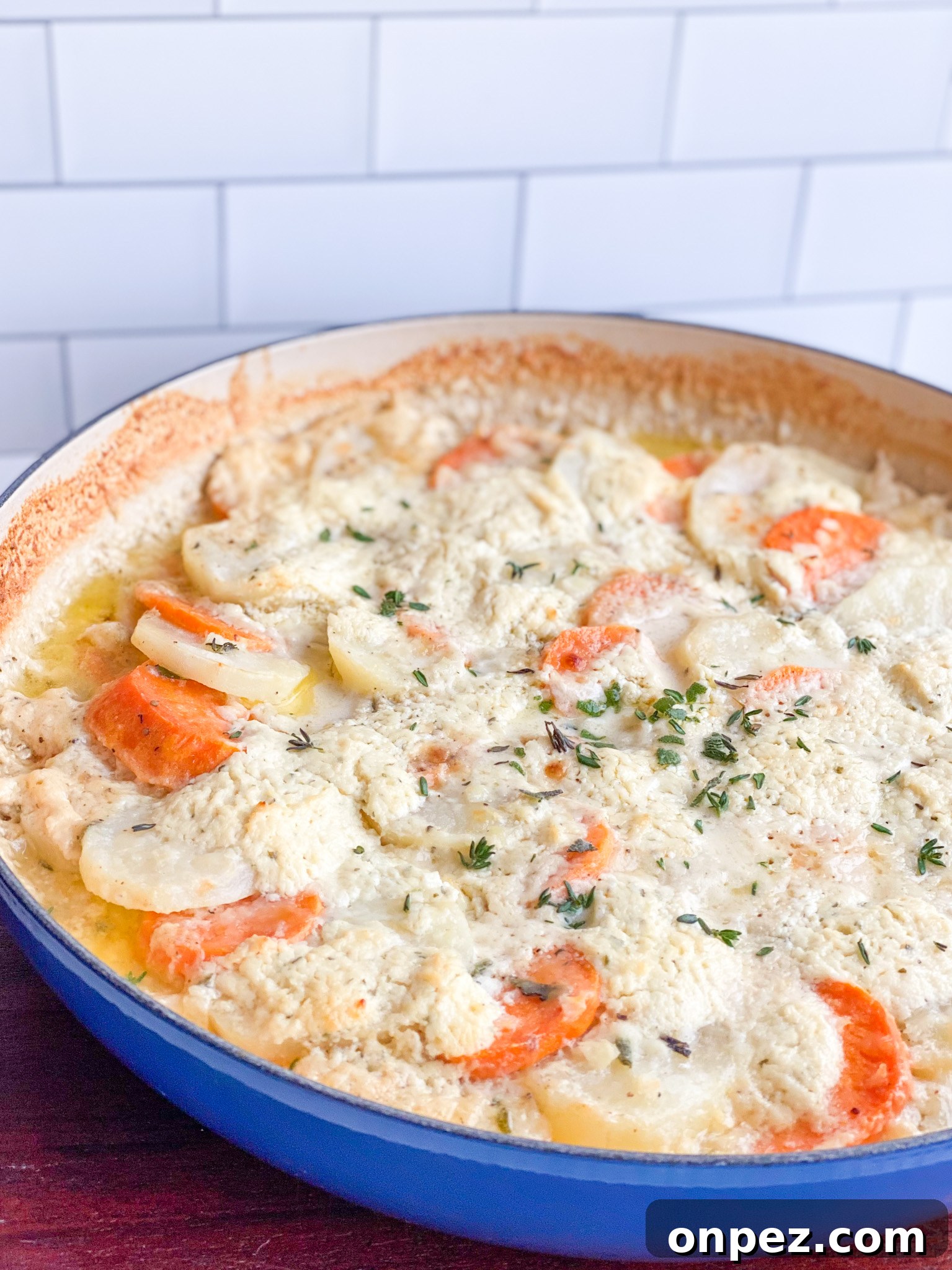 Scalloped Yukon Gold and Sweet Potato Gratin 6 Baked scalloped Yukon Gold and sweet potatoes with cheese