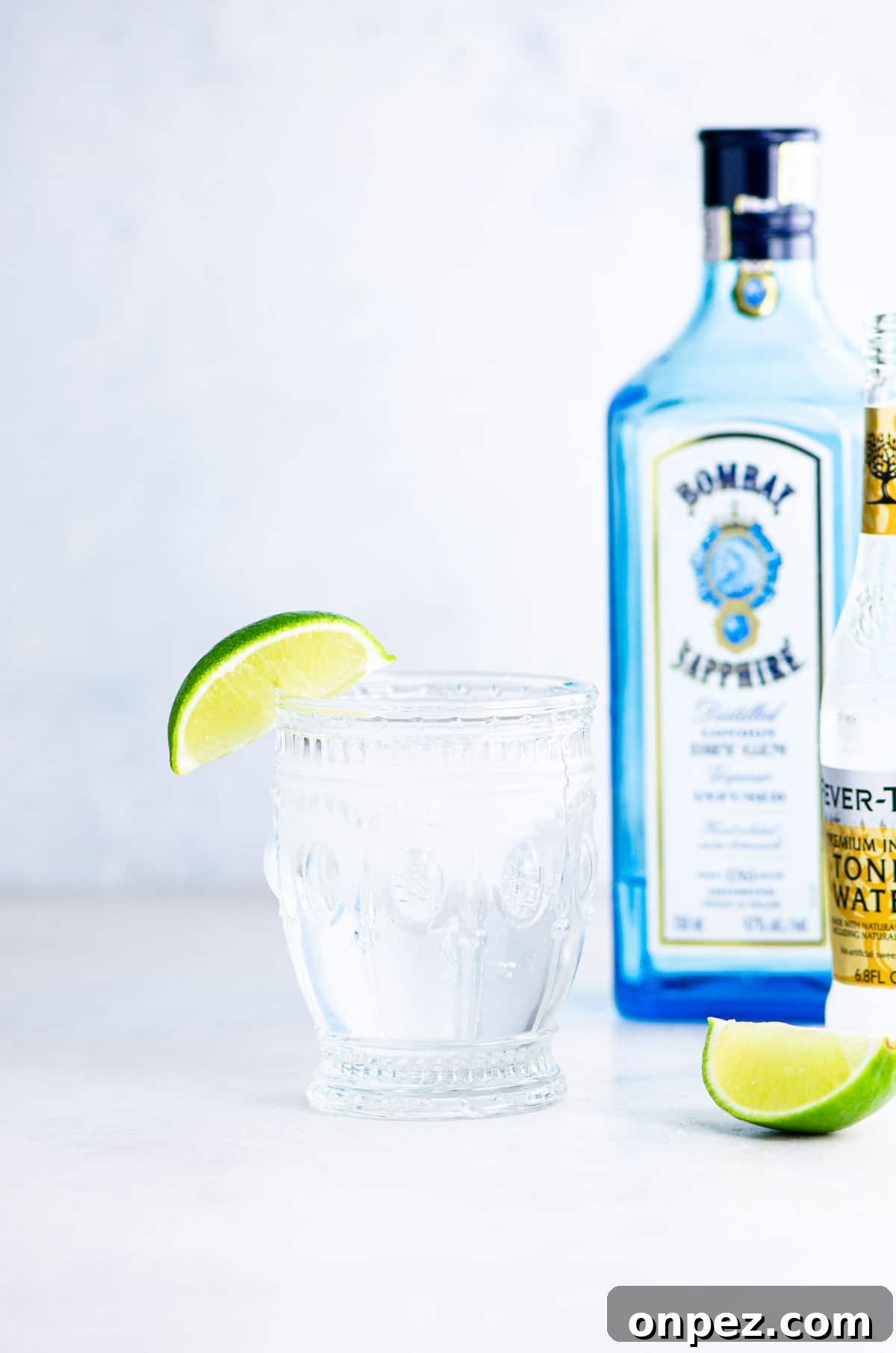 Gin and tonic with lime wedge and Bombay Sapphire