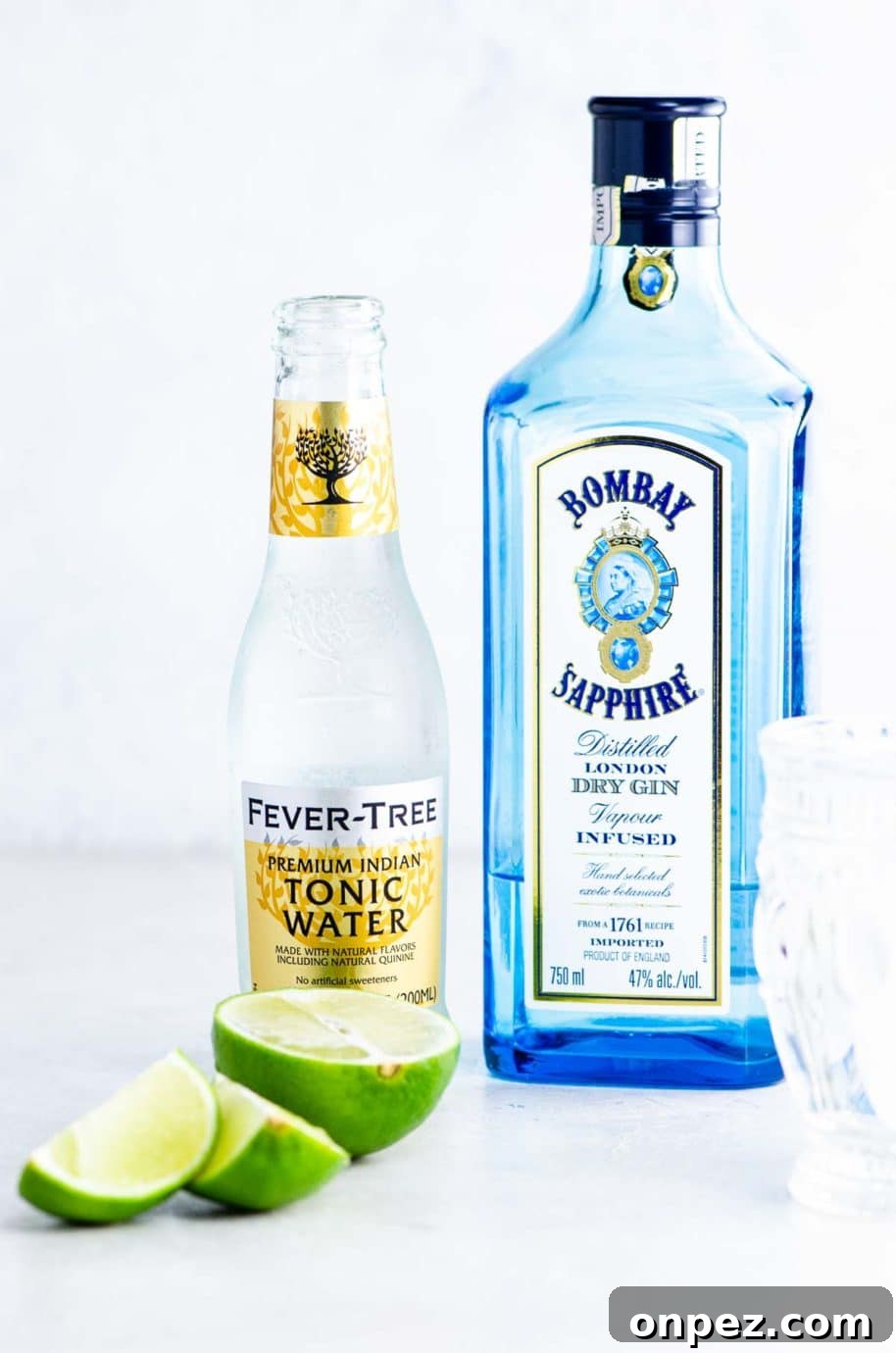 sapphire gin, fever tree tonic water, and lime