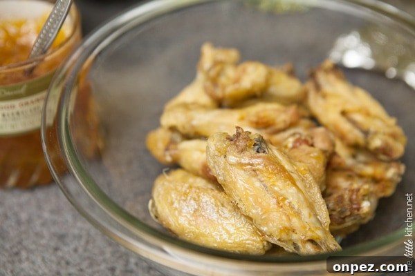 Sweet and Spicy Four Ingredient Chicken Wings from thelittlekitchen.net Sweet and Spicy Four Ingredient Chicken Wings from thelittlekitchen.net