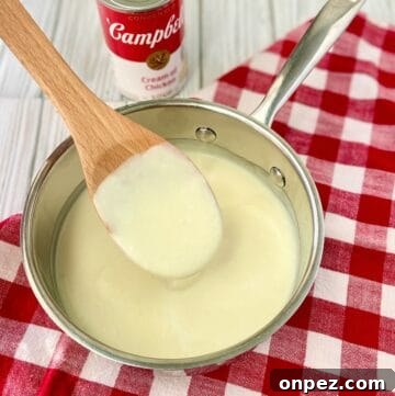 Condensed Cream of Chicken Soup from Scratch 5 Condensed cream of chicken soup in saucepan.