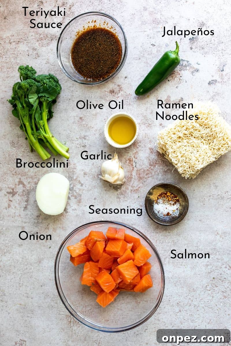 Ingredients needed to make this salmon. Everything is in bowls on a grey counter. 