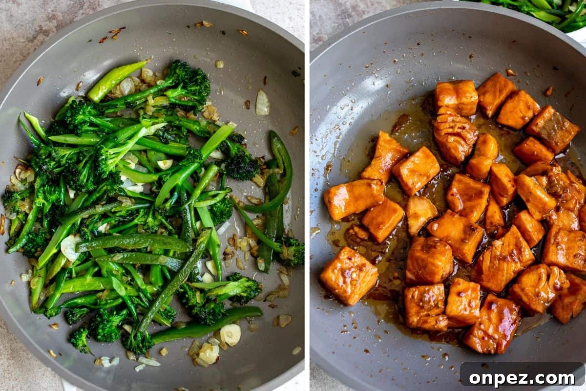 Grey sauté pan with broccolini sautéed, and salmon sautéed.