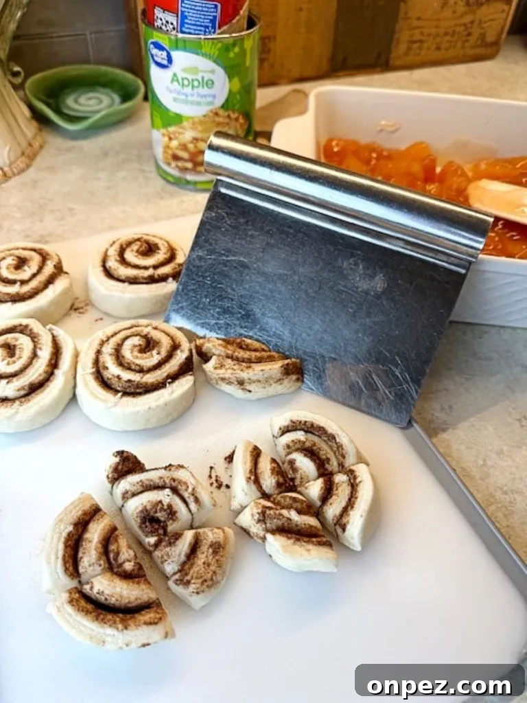 cinnamon roll quarters added to the apple filling