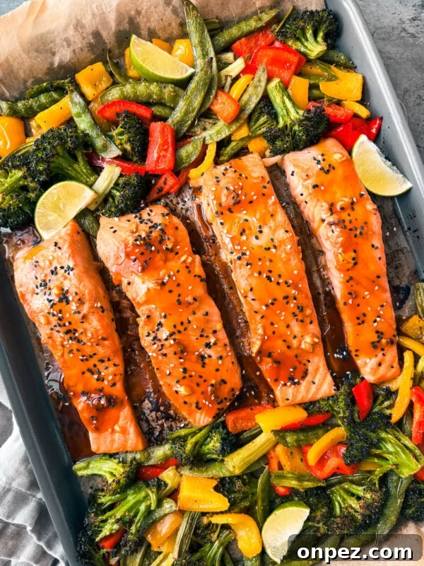Sheet Pan Turkey Sausage with Roasted Peppers 8 Teriyaki salmon with veggies on a sheet pan.