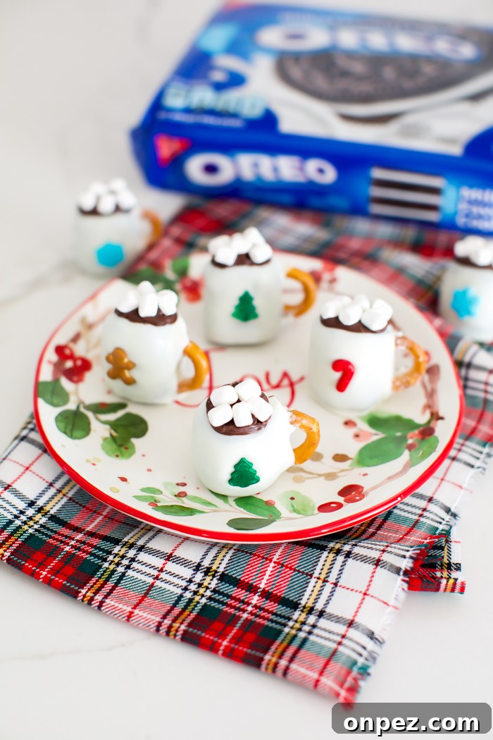 Christmas Oreo Truffles: Festive No-Bake Cookie Balls 7 OREO ball hot chocolate mug topped with chocolate and mini marshmallows