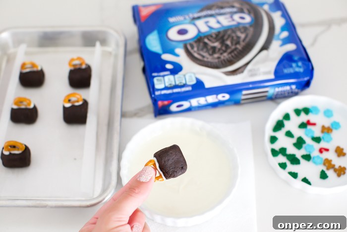 Christmas Oreo Truffles: Festive No-Bake Cookie Balls 3 How to dip oreo balls in melted chocolate