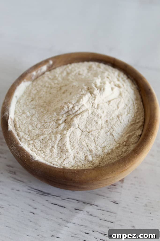 4 Teff Flour Substitutes for Similar Texture and Nutrition 5 buckwheat flour in a brown bowl