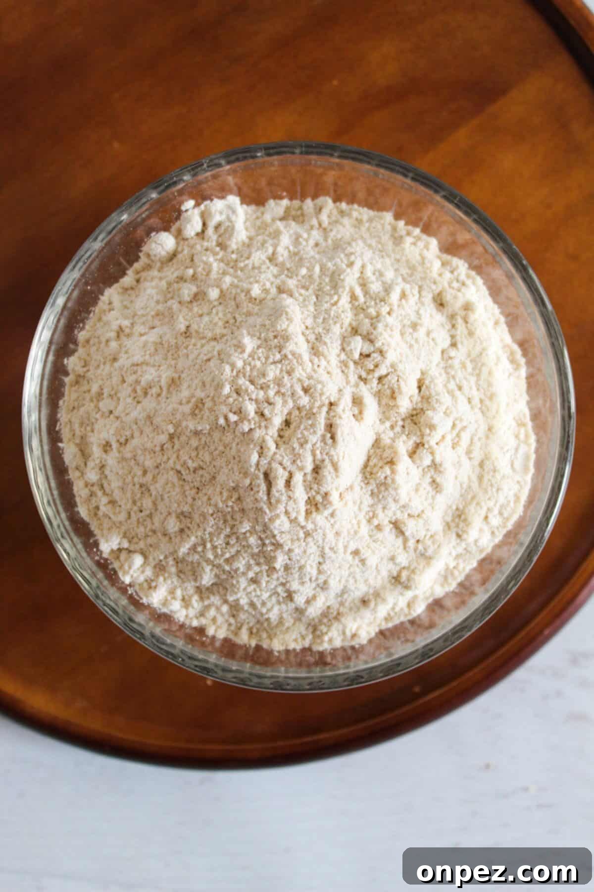 4 Teff Flour Substitutes for Similar Texture and Nutrition 7 overhead of sorghum flour in a bowl.