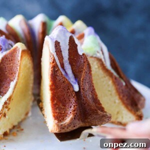 Mardi Gras King Pound Cake slice being removed on cake server.
