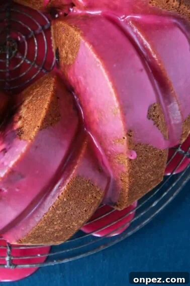 Mardi Gras Bundt Cake with Colorful Glaze 8 Cherry Almond Pound Cake pink cherry glaze dripping.