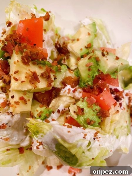 Adding toppings to salad wedges