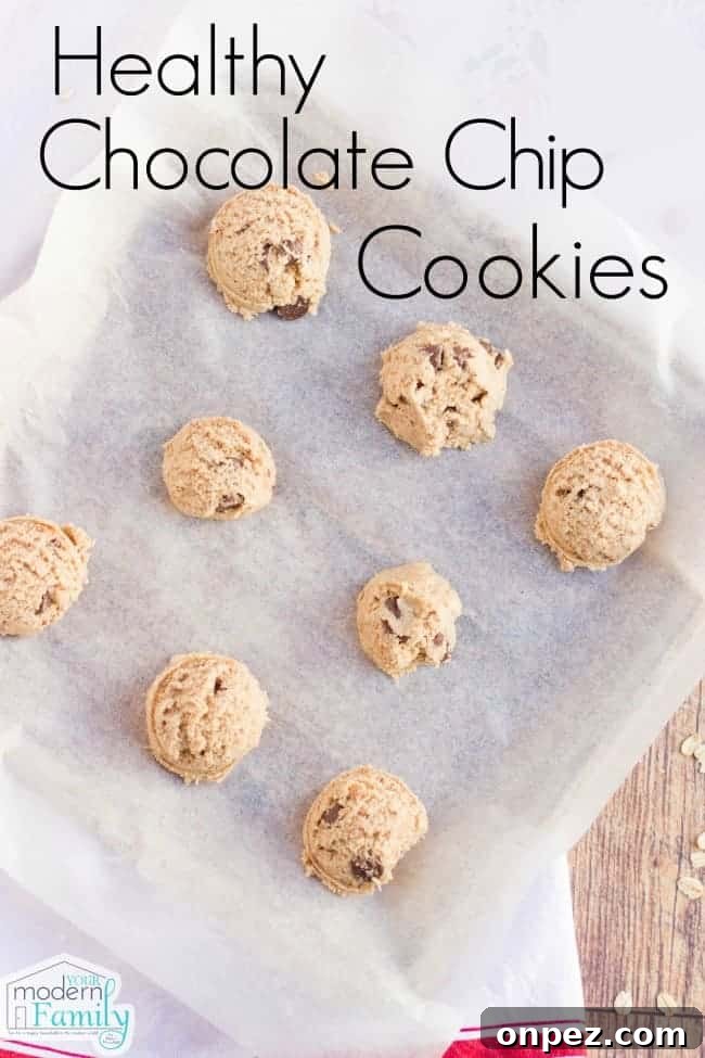 A bunch of unbaked cookies on a tray.