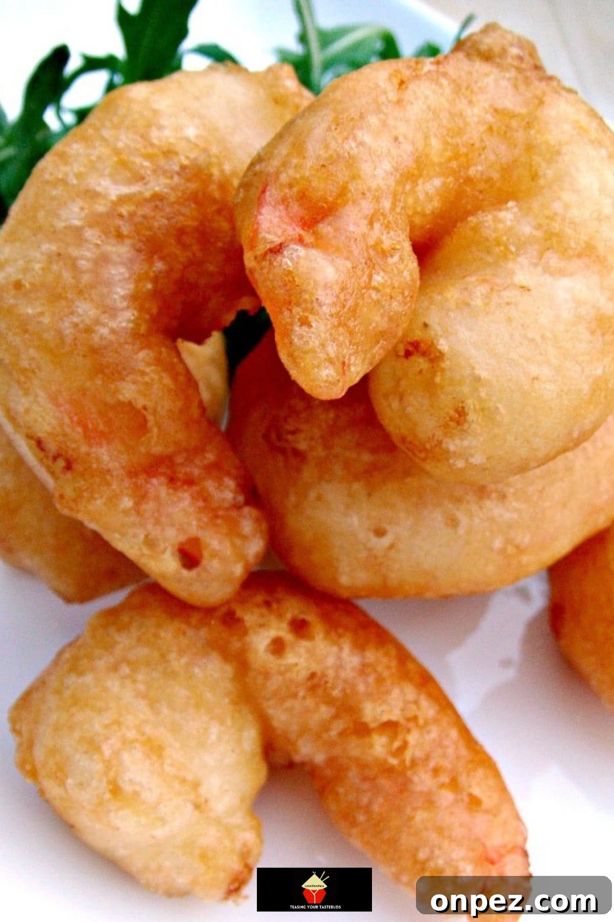 Crispy Beer Battered Shrimp. Light and crispy batter around delicious juicy shrimp, add your favorite dip and these are a perfect starter or party food.