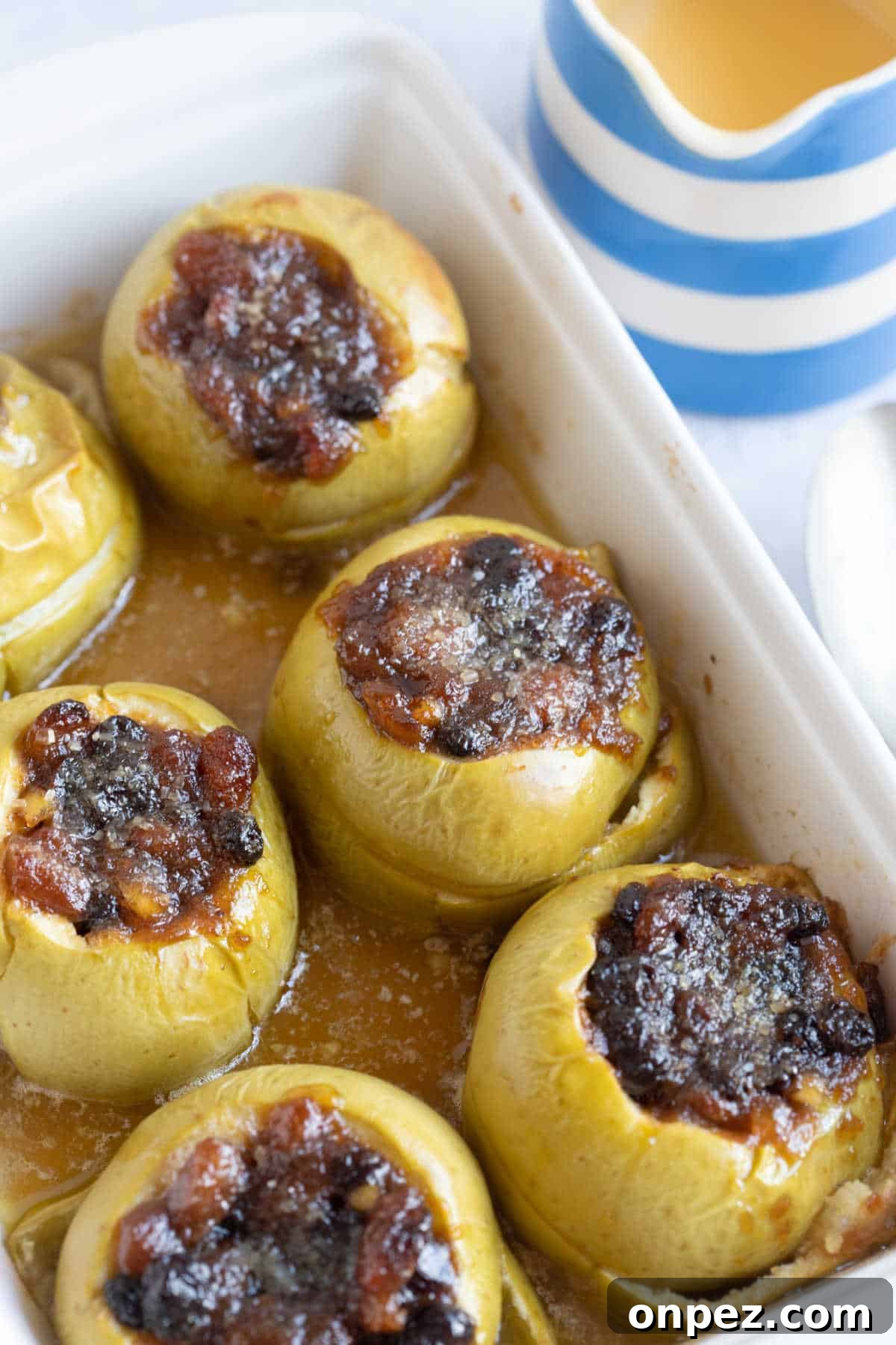 Mincemeat Baked Apples in a white baking dish.