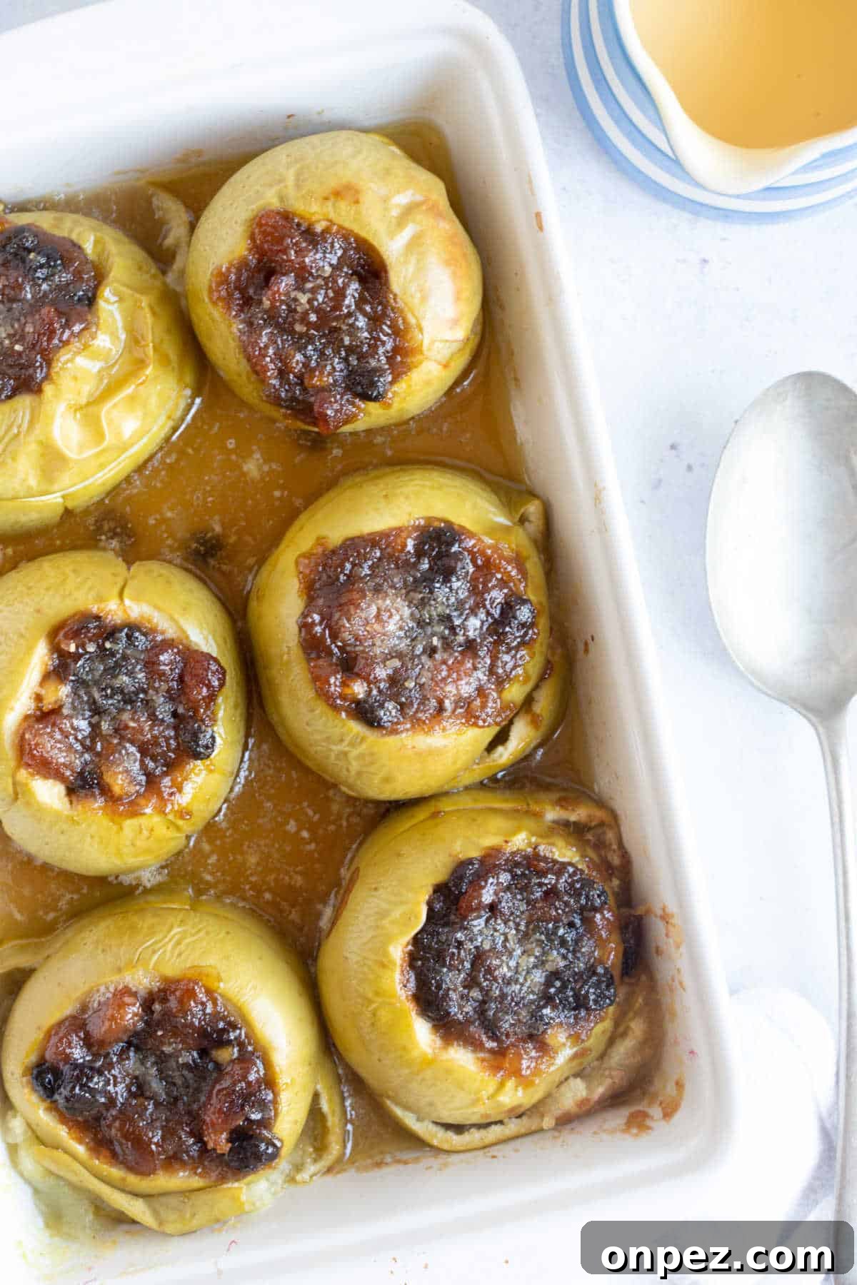 Baked apples in a baking dish.