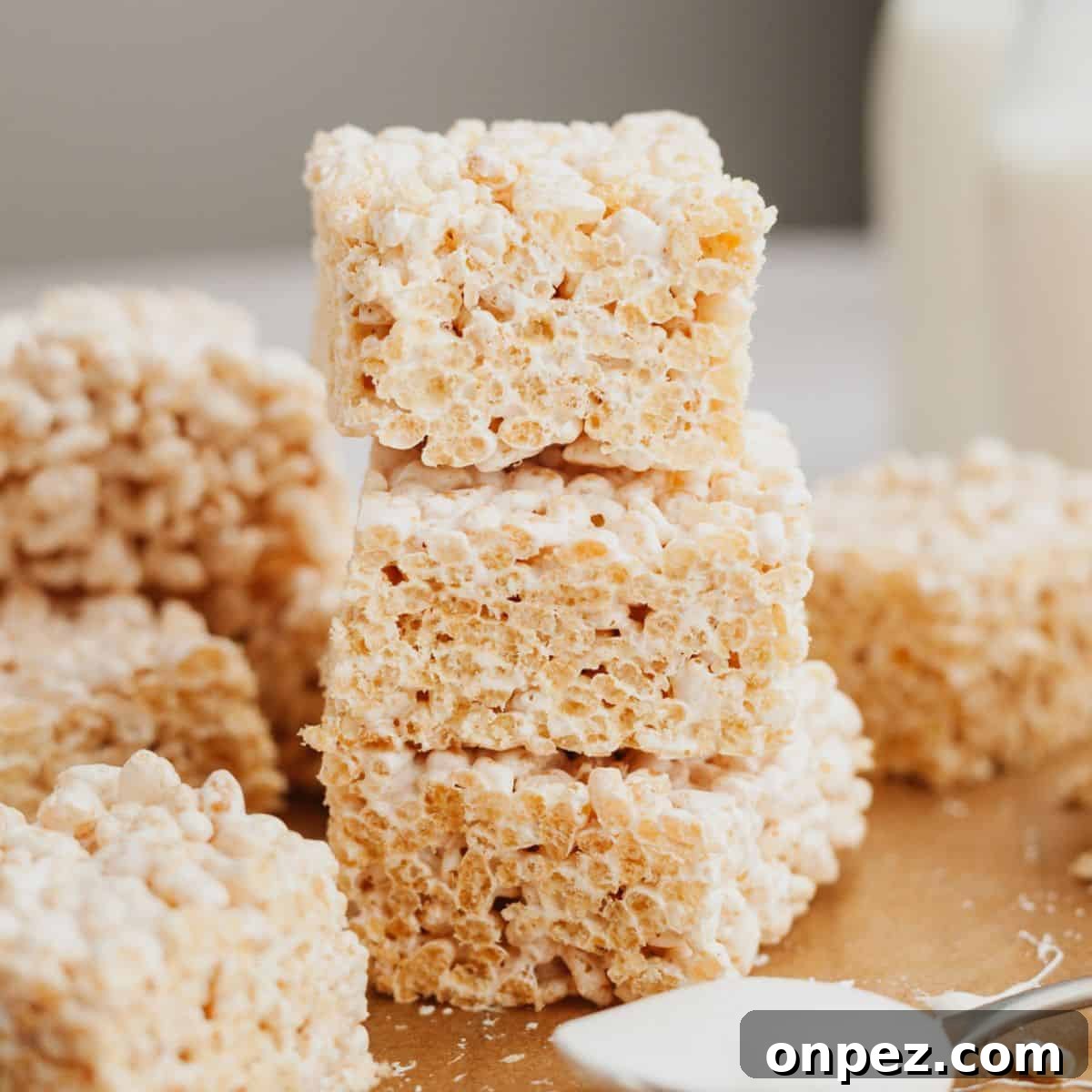 A stack of three rice krispie treats.