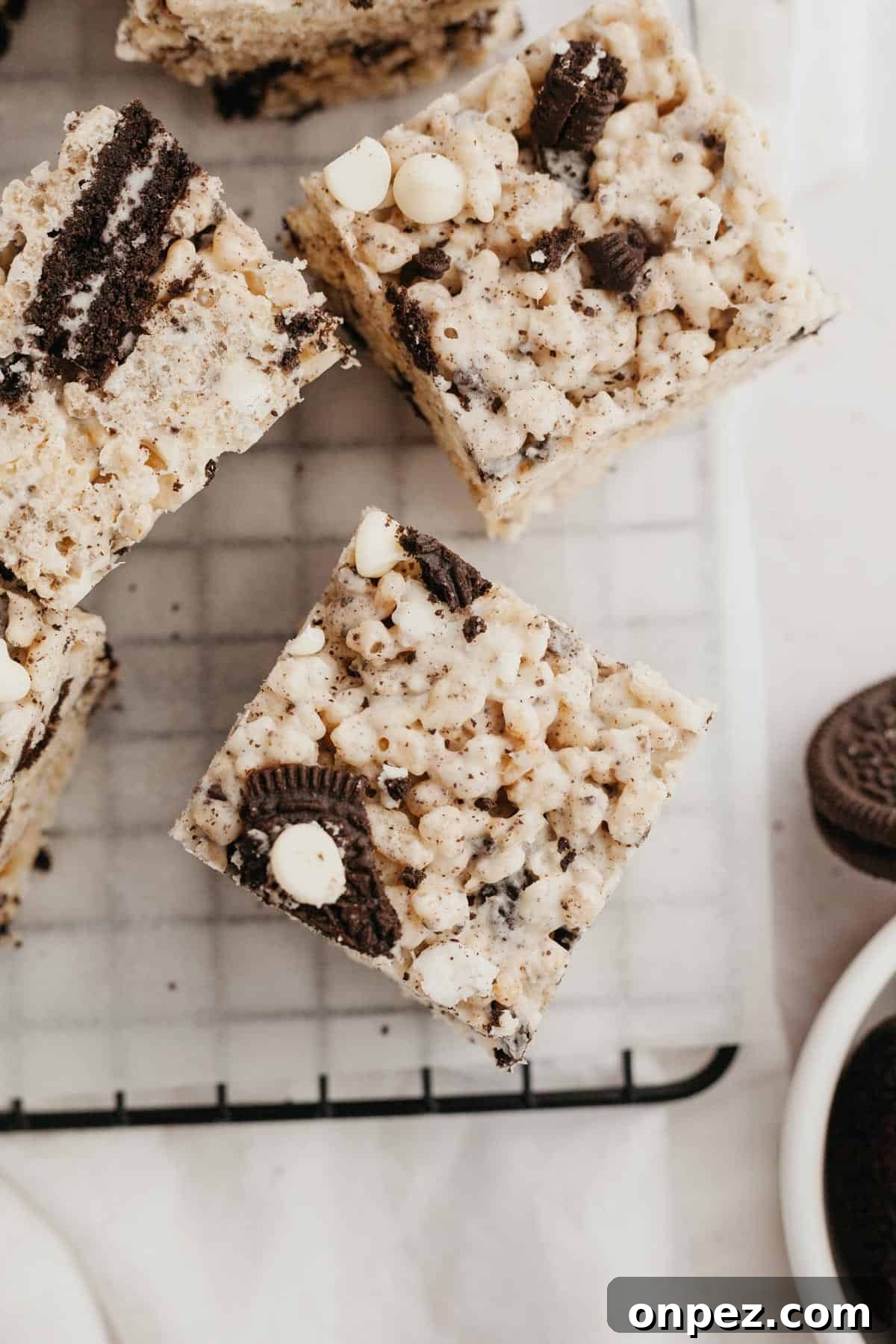 Oreo rice krispie treats on parchment paper.