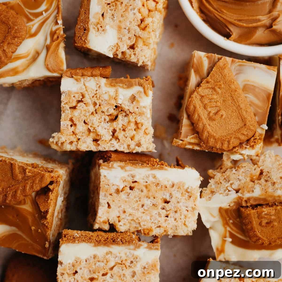 Cookie butter rice krispie squares, some are on their sides.