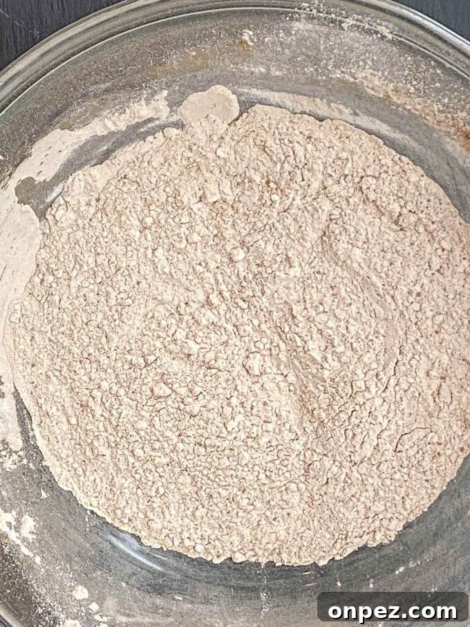 A bowl with sifted cocoa powder and flour