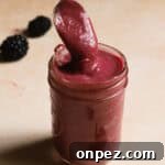 Small bowl of blackberry curd.