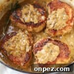 Smothered pork chops in mushroom gravy.