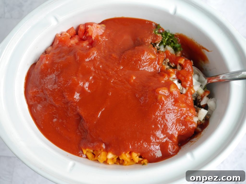 Copycat Olive Garden Three-Meat Sauce in the Crockpot 5 Tomato paste and water