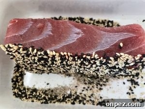 Sesame Crusted Tuna Tataki with Pickled Onions 5 Coat tuna with sesame
