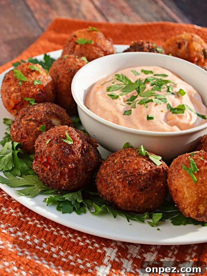 Crispy Cheesy Crab Poppers with Spicy Aioli 2 Cheesy Crab Poppers-- this tasty appetizer will have your guests begging for more!