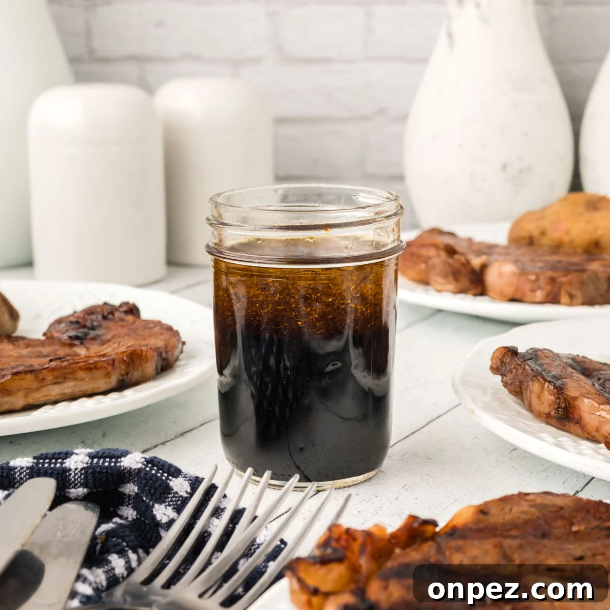 3-Ingredient Steak Marinade for Juicy, Tender Steaks 8 A glass jar filled with 3 Ingredient Steak Marinade.