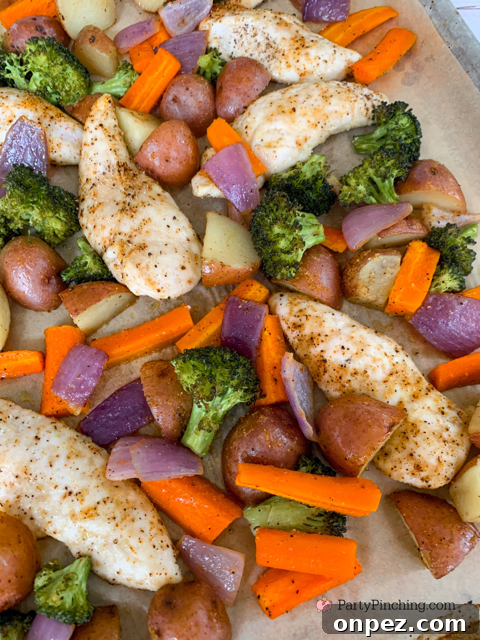 Spicy Sheet Pan Chicken Dinner with Vegetables 7 Baked spicy chicken sheet pan dinner with roasted vegetables
