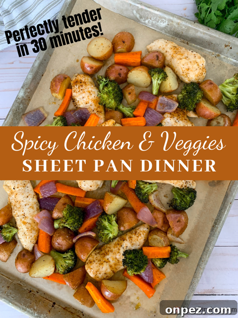 Spicy Sheet Pan Chicken Dinner with Vegetables 8 Finished spicy chicken and roasted vegetable sheet pan dinner