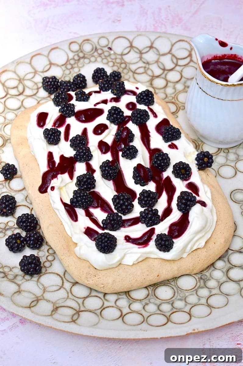Fruity Bakes Cakes Crumbles and Dessert Recipes 4 Rectangle Hazelnut meringue with cream and blackberries on top