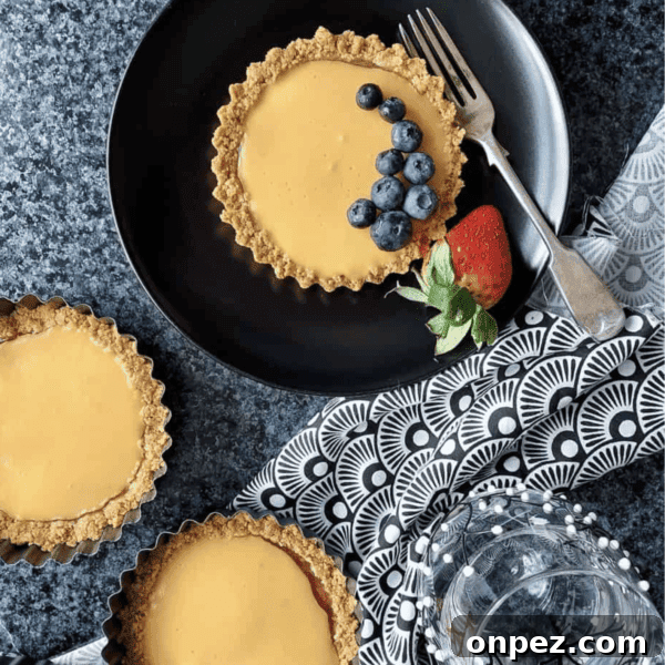 Fruity Bakes Cakes Crumbles and Dessert Recipes 8 Rhubarb and custard tarts decorated with fruit