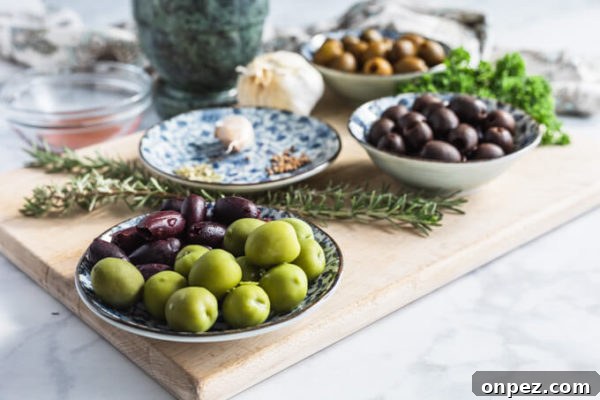 Garlic and Herb Marinated Olives Recipe 3 Marinated olives ingredients: assorted olives, spices, garlic, rosemary and parsley