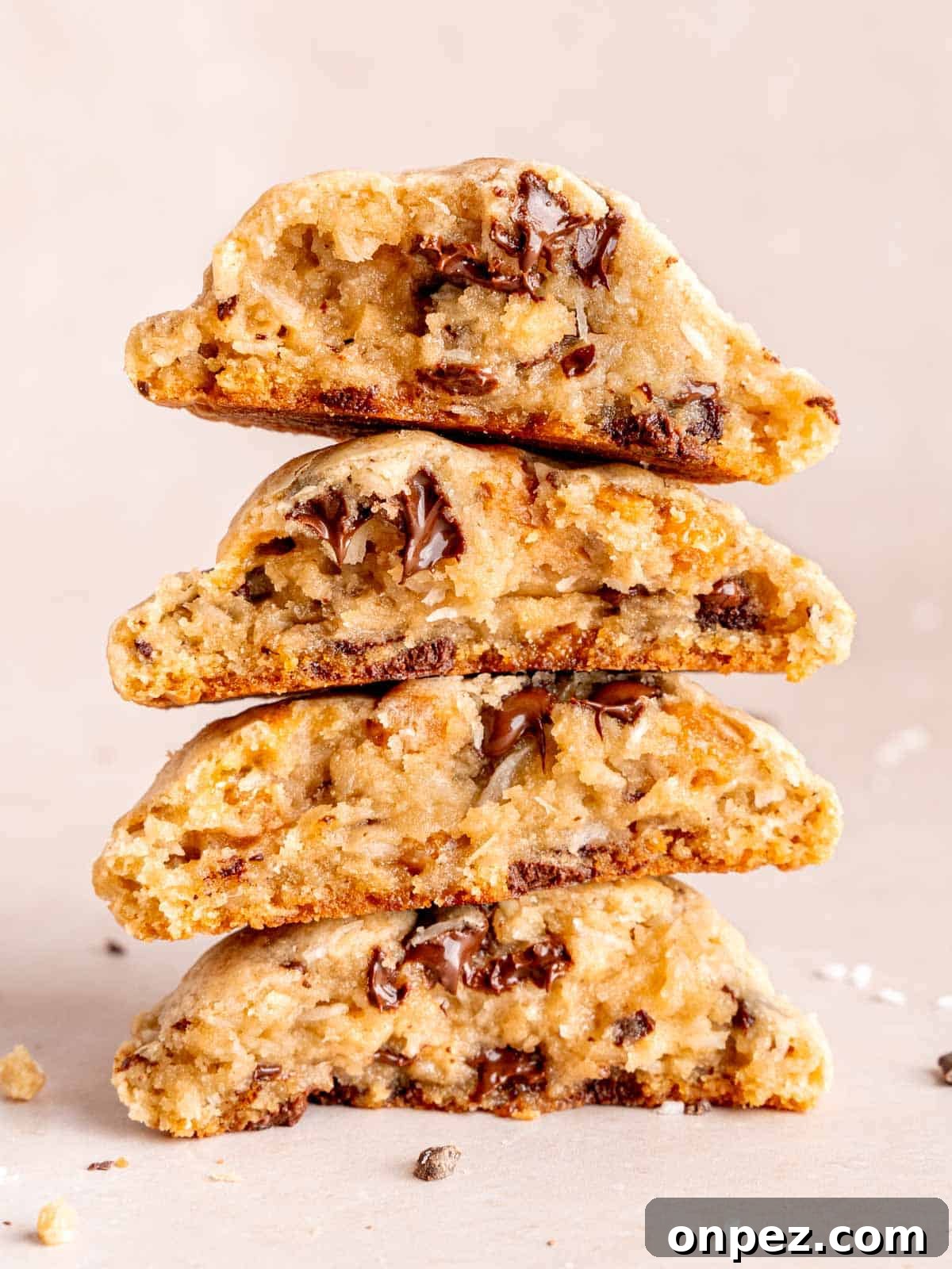 Levain Bakery Copycat Caramel Coconut Chocolate Chip Cookies 2 A stack of thick Levain Bakery style caramel coconut chocolate chip cookies.