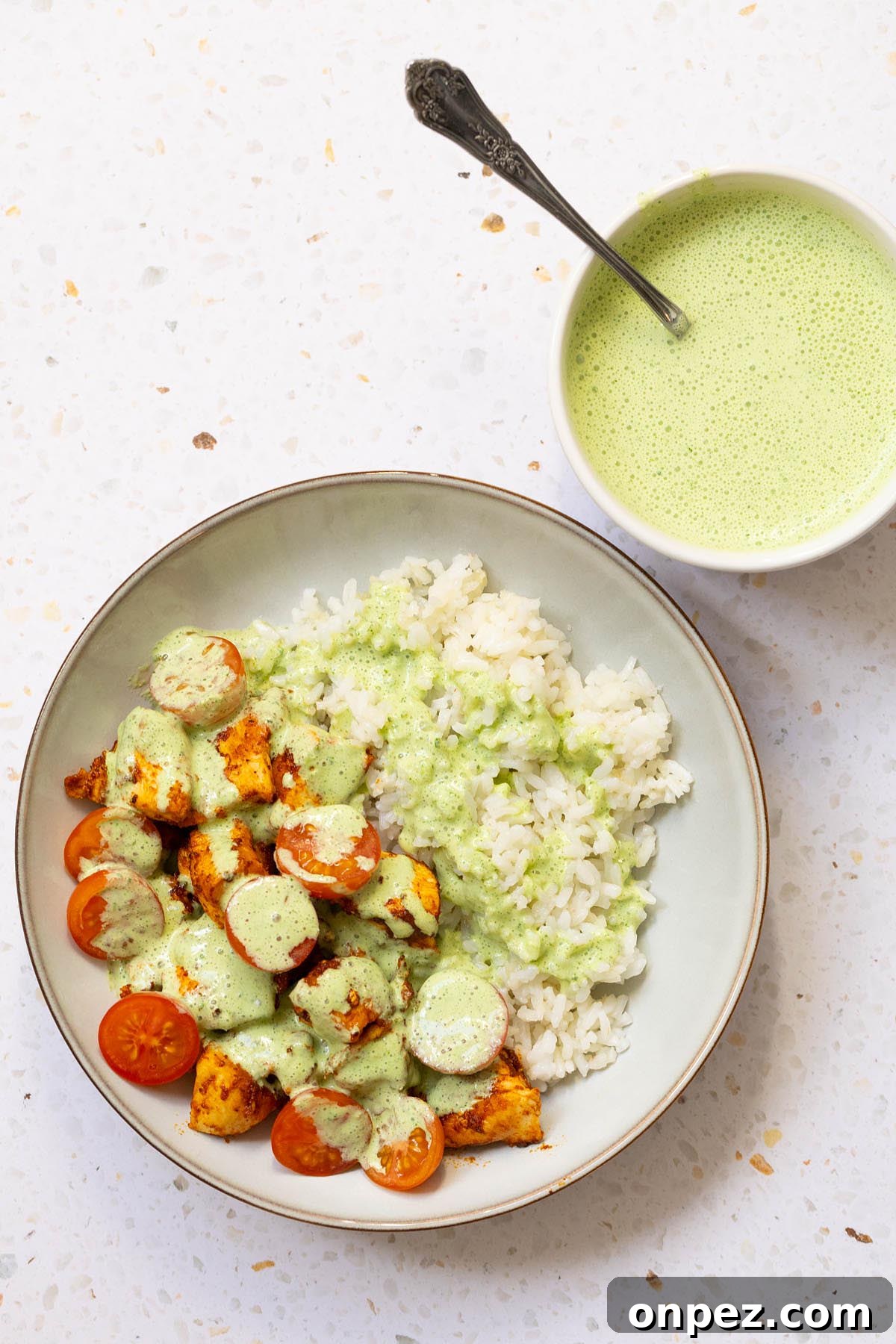 Yogurt mint sauce topping chicken and rice