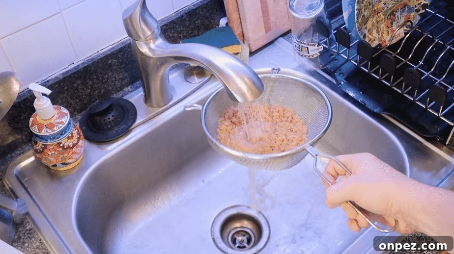 Instant Pot Brown Rice Recipe 4 Rinsing brown rice in a fine mesh strainer