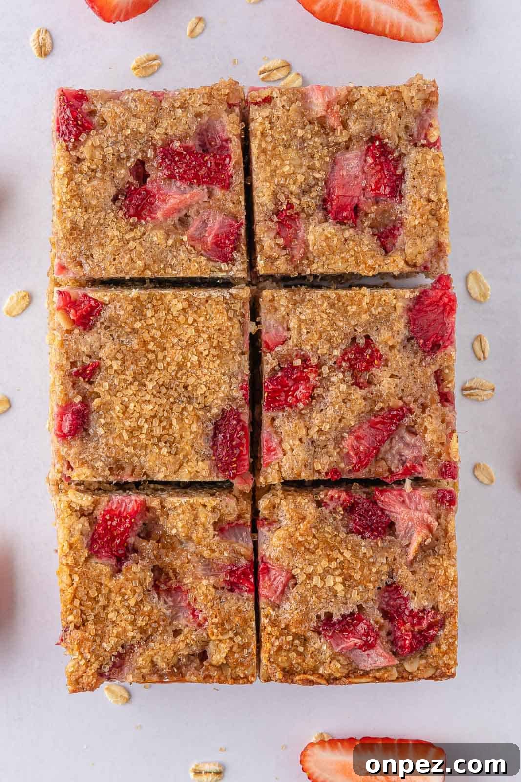 Tasty strawberry oatmeal bars cut into squares.