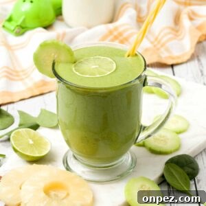 A glass of cucumber pineapple ginger Banana and lime detox smoothie