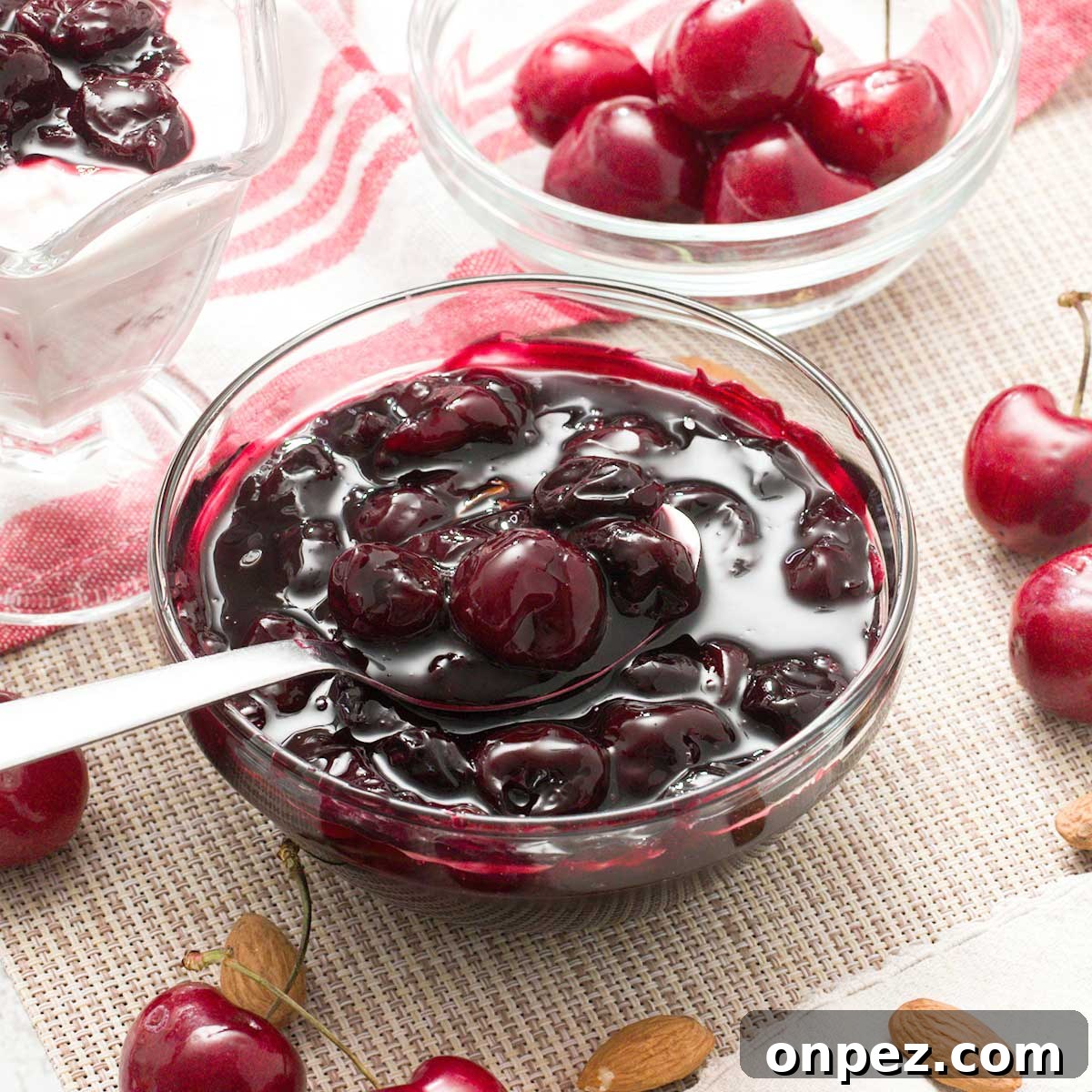 A bowl of cherry compote dessert sauce.