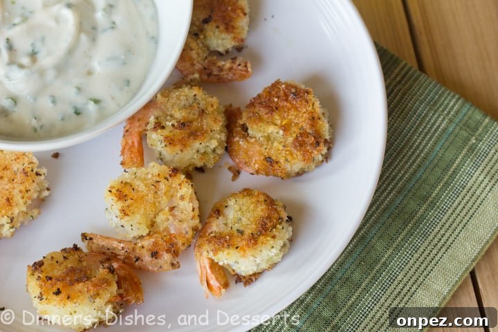 crispy herbed shrimp with chive aoli on a plate